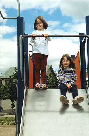Emma and Madelaine on the slide
