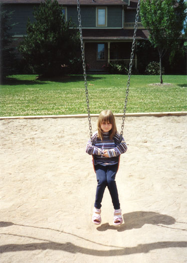 Maddie on the swing