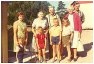 A visit from USA, summer 1971, and The �vendal natives poses in front of the camera.Back row, L to R: Inger Golf, Johanna Ougendal, Georg Ougendal, Sine Golf and Mandius D Golf.Front, L to R: Inger and Mandius' kids Terje, Kjell Johan, Odd Gunnar and Sigbj�rn.