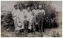A growing family gathers on the corn-fields in Minnesota, around 1925.Back row, left to right: Hans Kristian, Marie, Jakob, Gina , her son George and Magnus. In the front stands Melvyn and Norman, Gina and Magnus' two other sons.  James was still not born.
