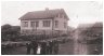 Probably the oldest outdoor picture from �vendal. Gunder Jakobsen and part of his family  proudly poses in front of their new home, built in 1903. The stairs to the front door are yet to be completed, and judging from the age of  the children the picture was probably taken in 1904.Left to right : Hans Kristian, Gunder, Gunda, Ingeborg, Georg, Jakob and finally the 64 year old grandmother Ingeborg Hanssen who was Gunders mother.Gina, Inga and Sine were absent from the picture while Ida was still not born.The house was built in a style that was quite common for that period.Many houses in Egersund  built around the turn of the century are of similar size and style.