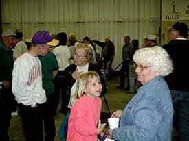 Johnson familys socialize at the auction