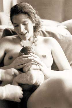 Immediatly after birth, almost during it!