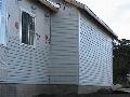 Siding on east side started