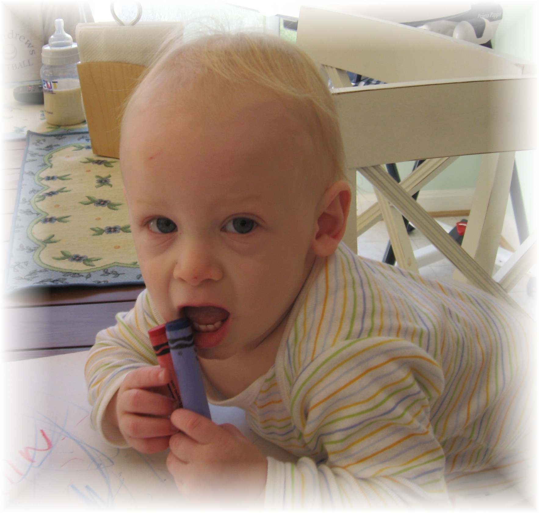 Aidan eating crayons