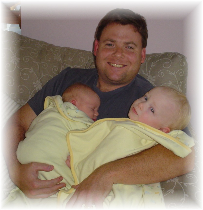 Daddy hugging his sons...