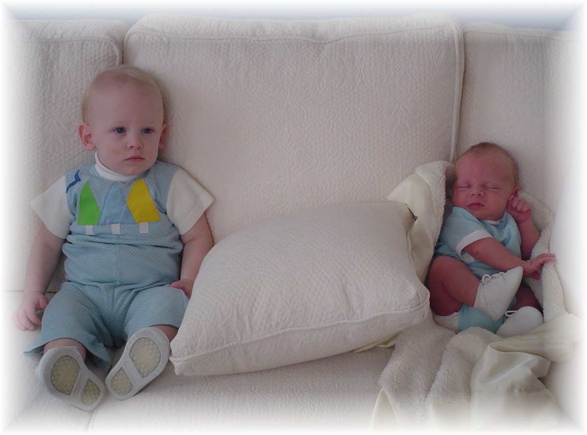 John Paul and Aidan wearing Daddy's baby clothes