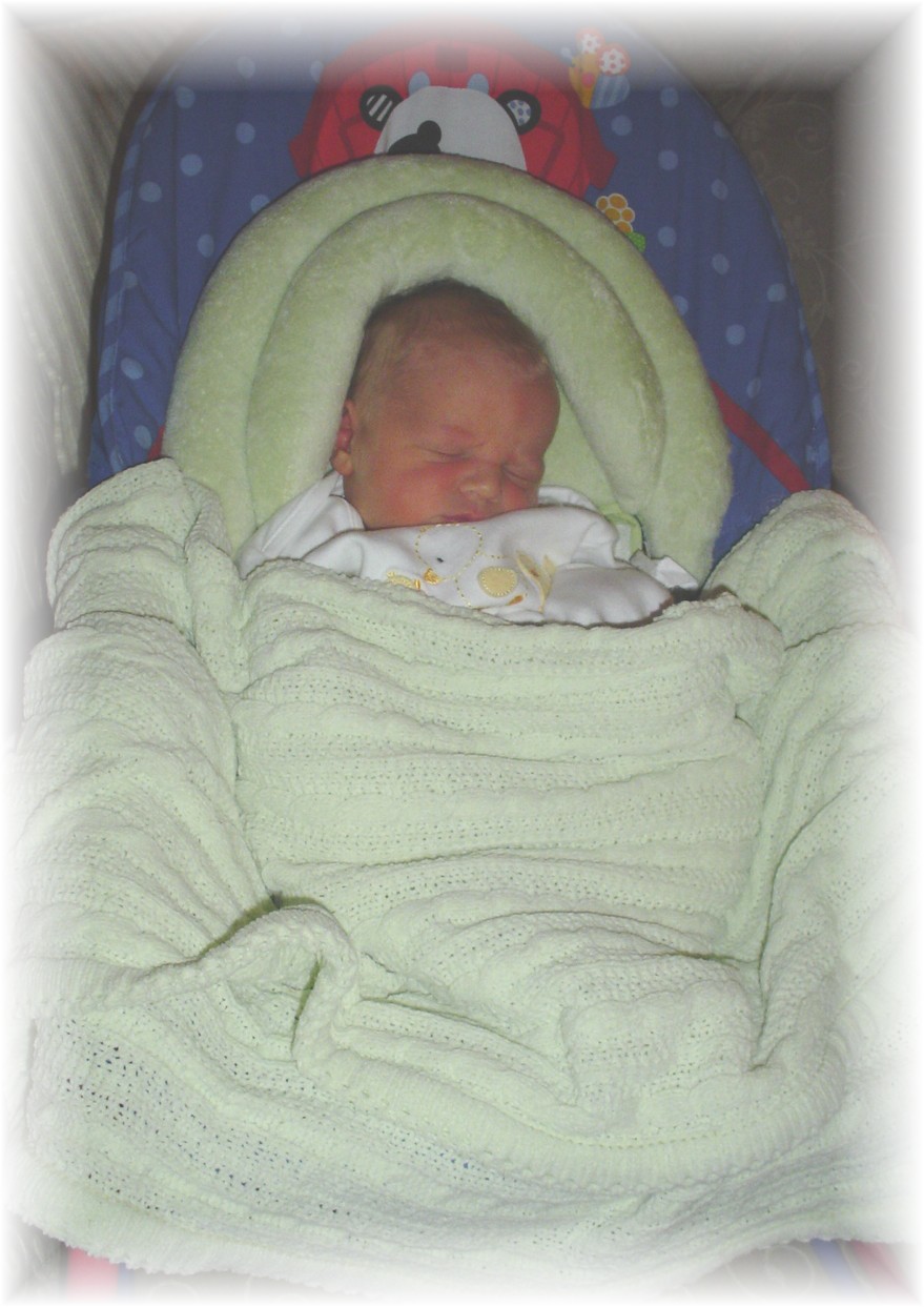 John Paul's first time in the bouncer seat!