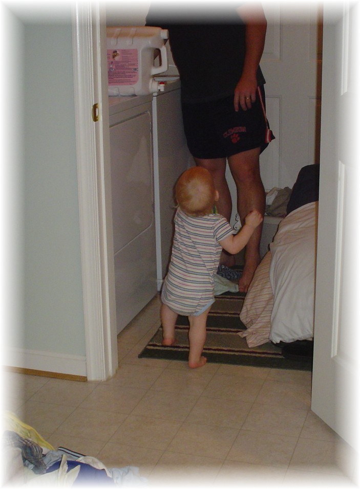 Aidan helping Daddy with laundry