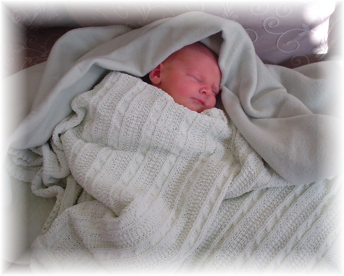 John Paul asleep in his boppy...