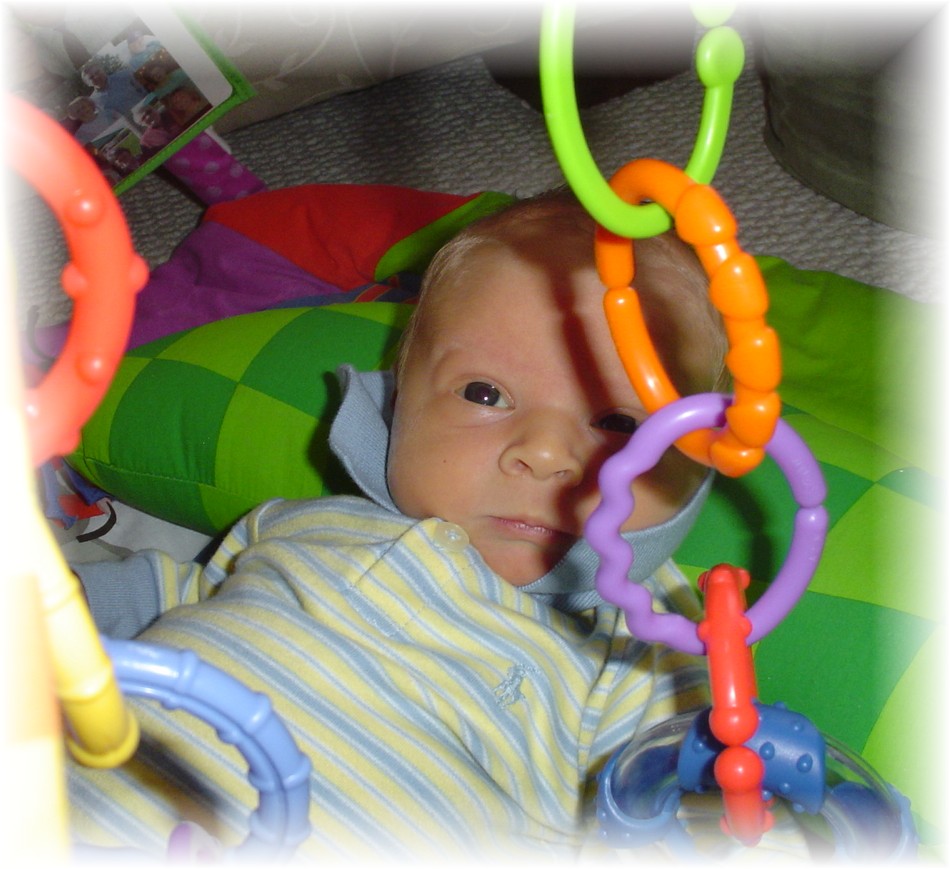 John Paul in his play mat...