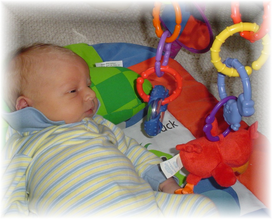 John Paul in his play mat...
