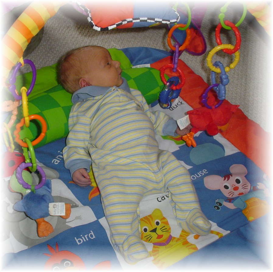 John Paul in his play mat for the first time...