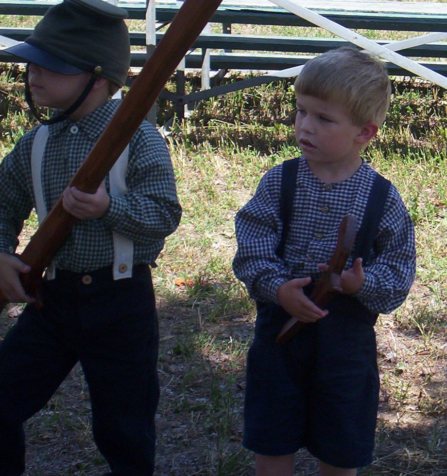 Matthew Meade and Sally's grandson participating in kids drill