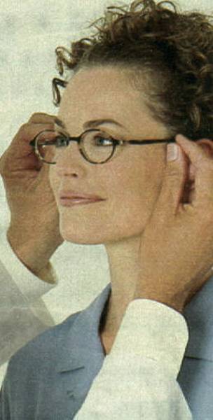 Here's She is in the Process of Being Fitting with Glasses