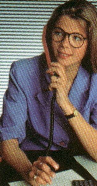 Here she is Working for the Computer and on the Phone