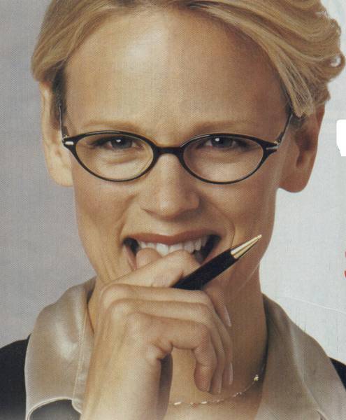 Here's a Lady Getting Ready to Eat Her Pen, Ummm Tasty?