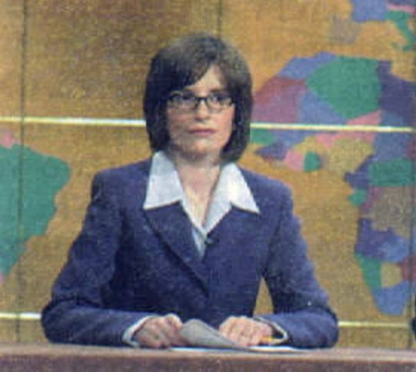 Here's Tina Sitting in Between 2 other Anchormen