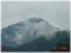 A view of the mountain, with fog