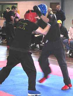 Andrew wrestling with his opponent.