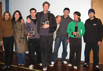 Trudy, Deanne, Andrew, Ollie, Jason, Paul, Anna and Ho with trophies won.
