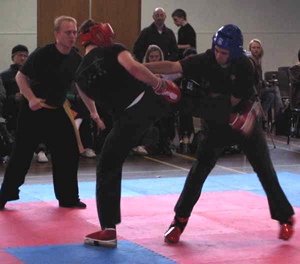 Ollie gets a quick round house kick in.