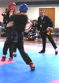 Ollie (in red) takes advantage of his opponent dropping his guard.