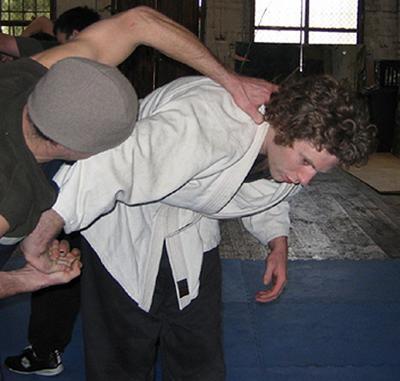 Dave practises grappling with Ollie.