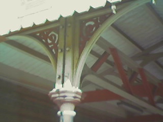 decorative bracing on canopy supports.