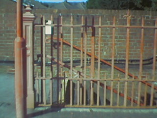 Railings at Up platform underpass steps.