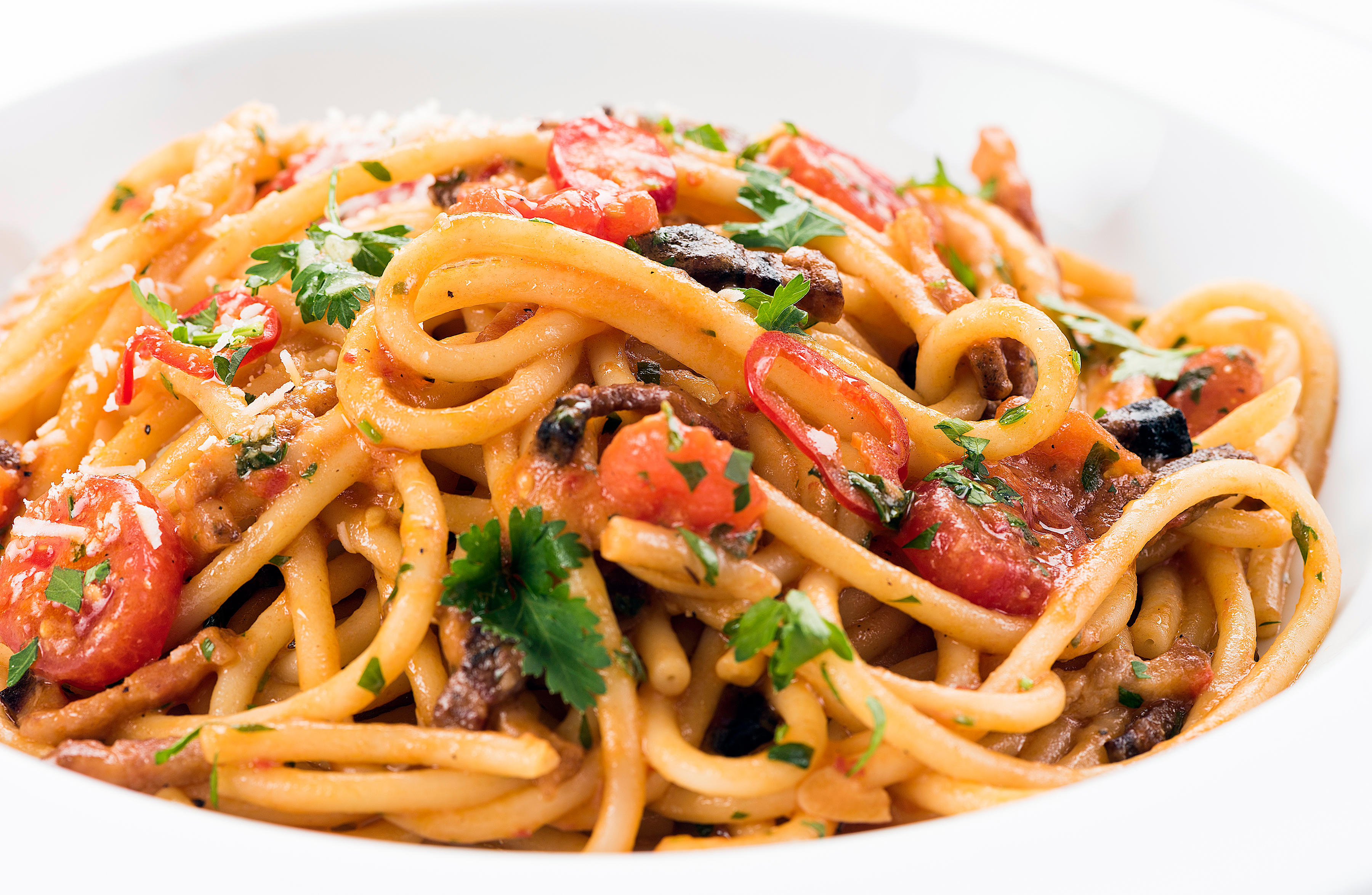 A bowl of homemade spaghetti.
