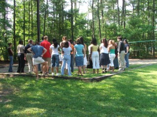 And some games . . . Here Delegation Leader Foster instructs about the suitcase relay race . . . 
