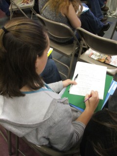 Delegates taking notes and learning . . . 