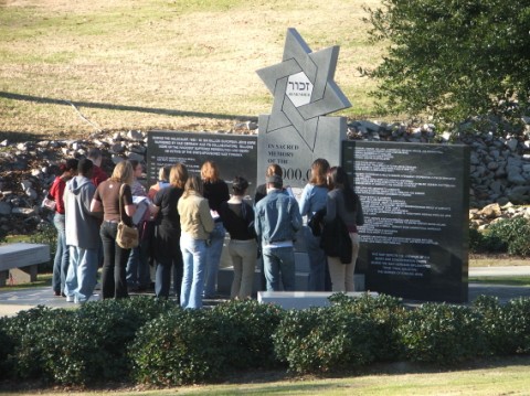 Delegates at the Holocaust Memorial . . . 
