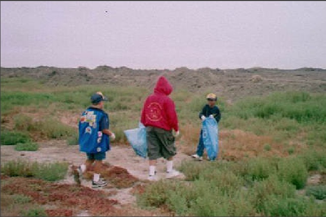The crew scours the shoreline for trash and recycleables