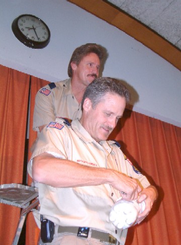 Asst Cubmaster and Cubmaster check to see if the egg is unbroken