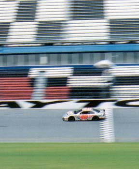 Number 40 zooms by the start/finish line