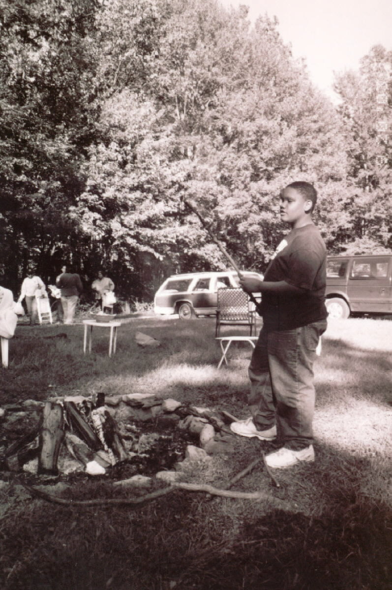 Black and White photo of David at the hog roast
