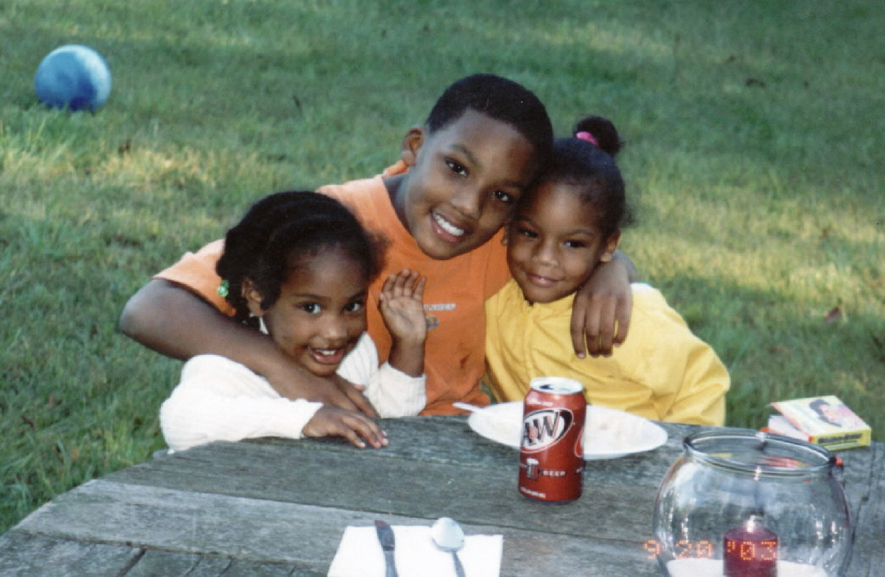 Shavani, Jonathan, and Kaia at the hog roast