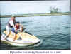 Eric and Nozomi on a jet ski subtitled.jpg (53100 bytes)