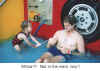Alex with a hose spraying me August 2000 subtitled.jpg (40971 bytes)