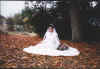 Takako sitting in a field of leaves.jpg (104798 bytes)