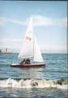 Paul and I on my boat waves cresting.jpg (66107 bytes)
