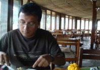 Pashu at his eggs!! apparently the cholesterol factor takes a toss during vacation..what the hell...let it be ...