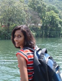 Fishtail lodge Pokhara, a beautiful resort that is accessed by boat or rafts, i am on one end and the lodge is across the lake in the dense forest area seen across