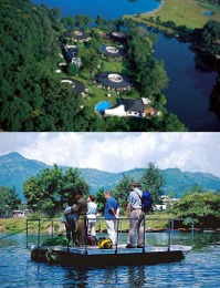 Fishtail lodge Pokhara, a beautiful resort that is accessed by boat or rafts, i am on one end and the lodge is across the lake in the dense forest area seen across
