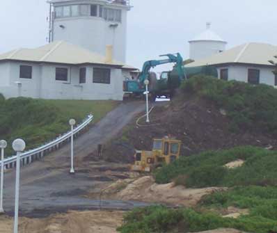 Bulldozers on Nobbys