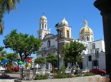 About 10km north of Comila, this village allows you a closer look at Volcano de Fuego. Locals however come for its fine handicrafts and its leafy plaza and church.