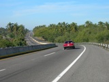 Riding a bike, I didn't have to pay the toll. Most local motorists use the non-toll road so traffic is light and there's even a paved shoulder to ride on.