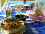 Lunch time!! Time to enjoy fresh seafood soup and a beer as waves crash below me on the beach